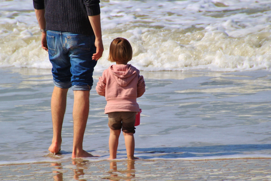 Parent and Kid on the Beach